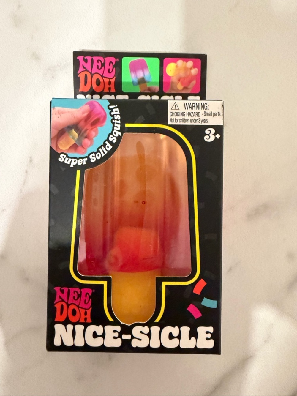New sealed authentic NeeDoh Nice-Sicle Popsicle Stress Toy - Red & Yellow